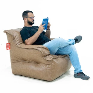 Puff Poltrono Bege Com Apoio de Pés – Conforto, Estilo e Versatilidade Para Seu Espaço.